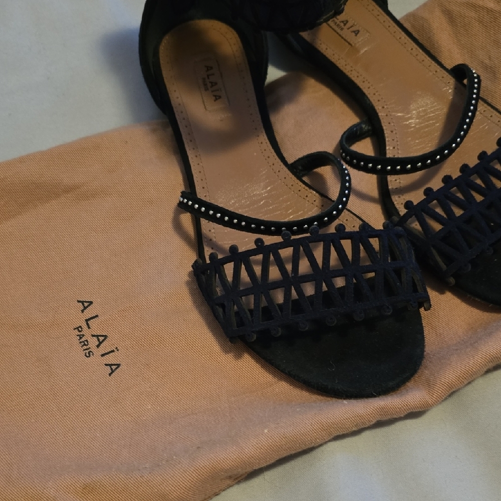 Alaia Black Suede Sandals with Intricate Cutout Design